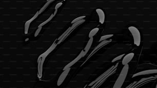 a black and white photo of a group of knives