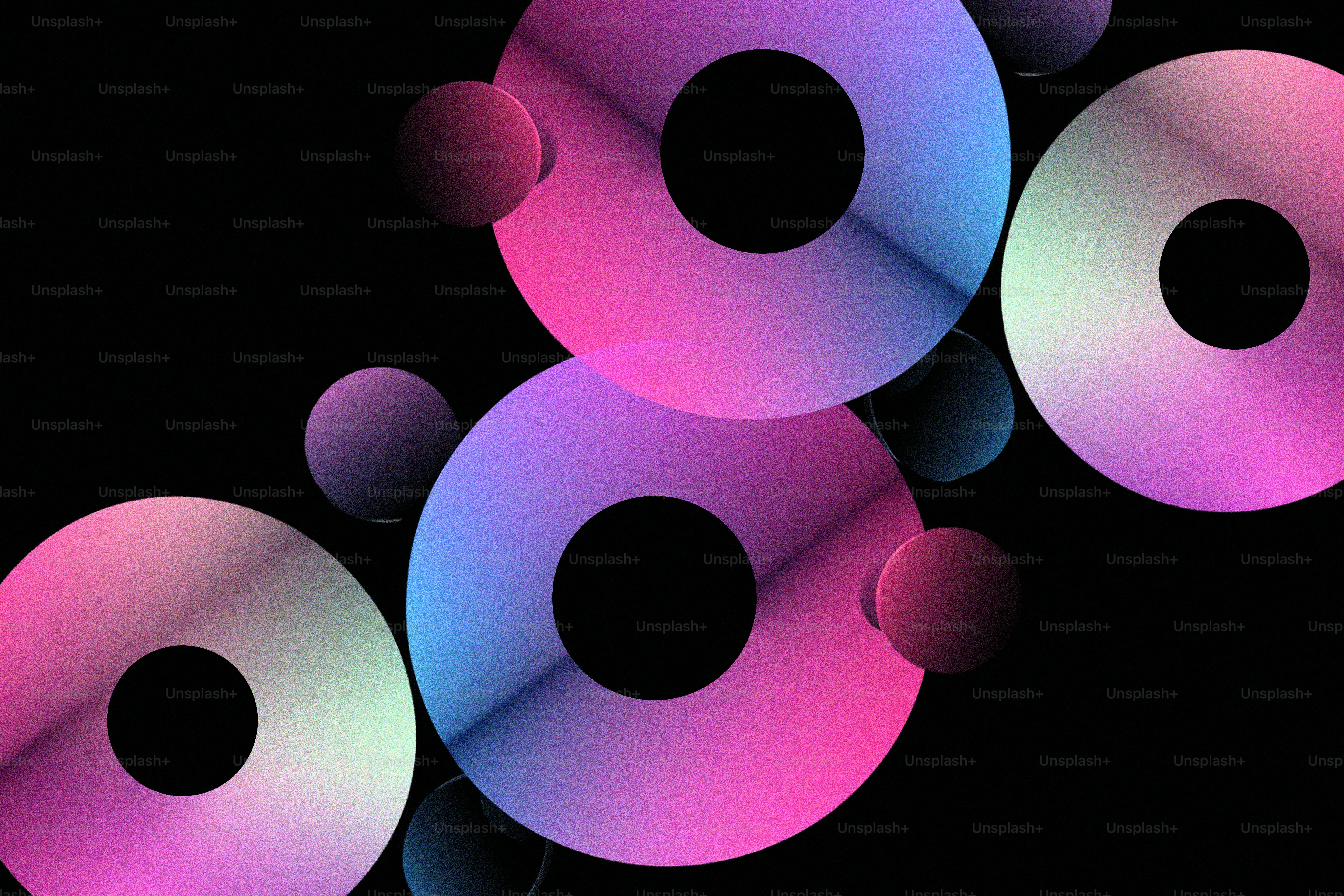 a group of circular objects on a black background