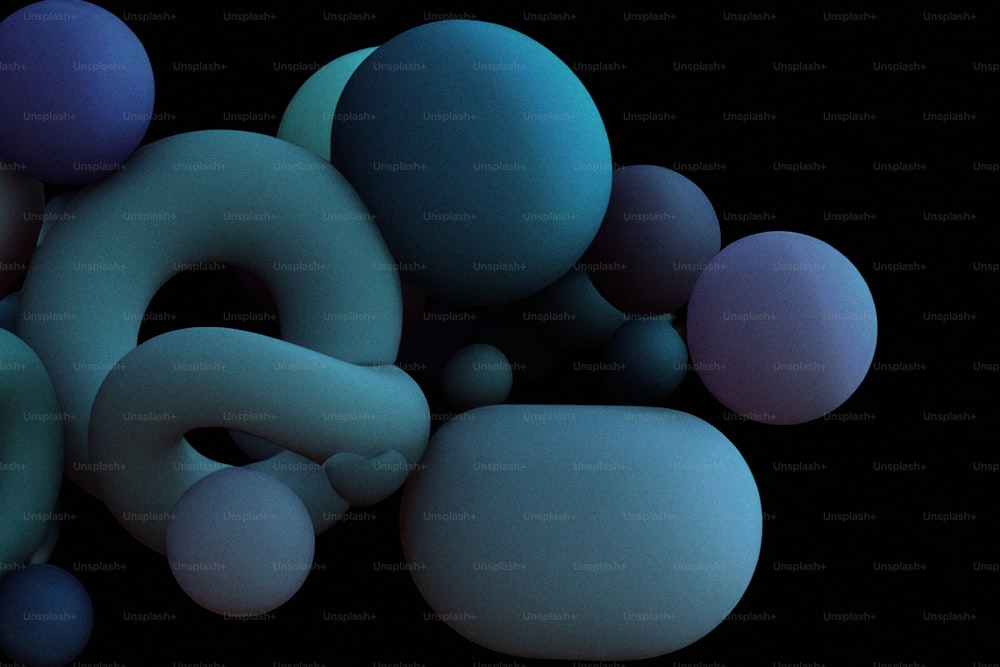 a bunch of blue and purple balls on a black background