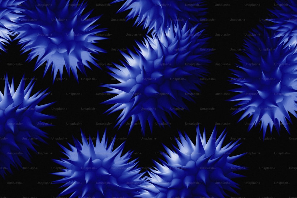 a pattern of blue flowers on a black background