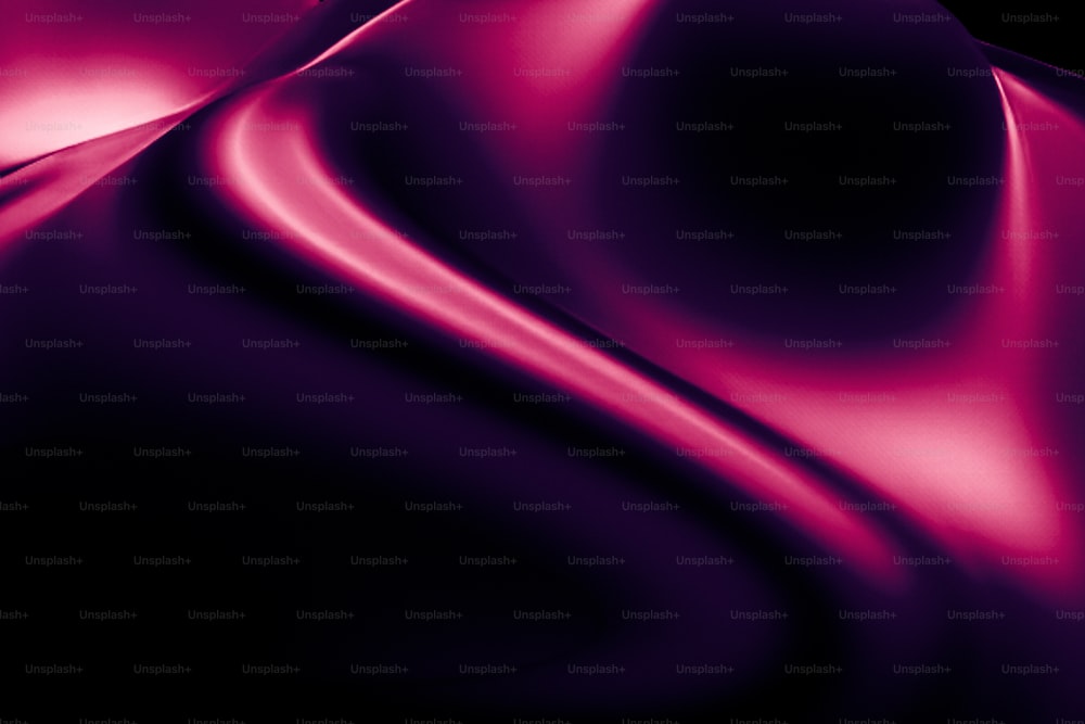 an abstract purple background with wavy lines