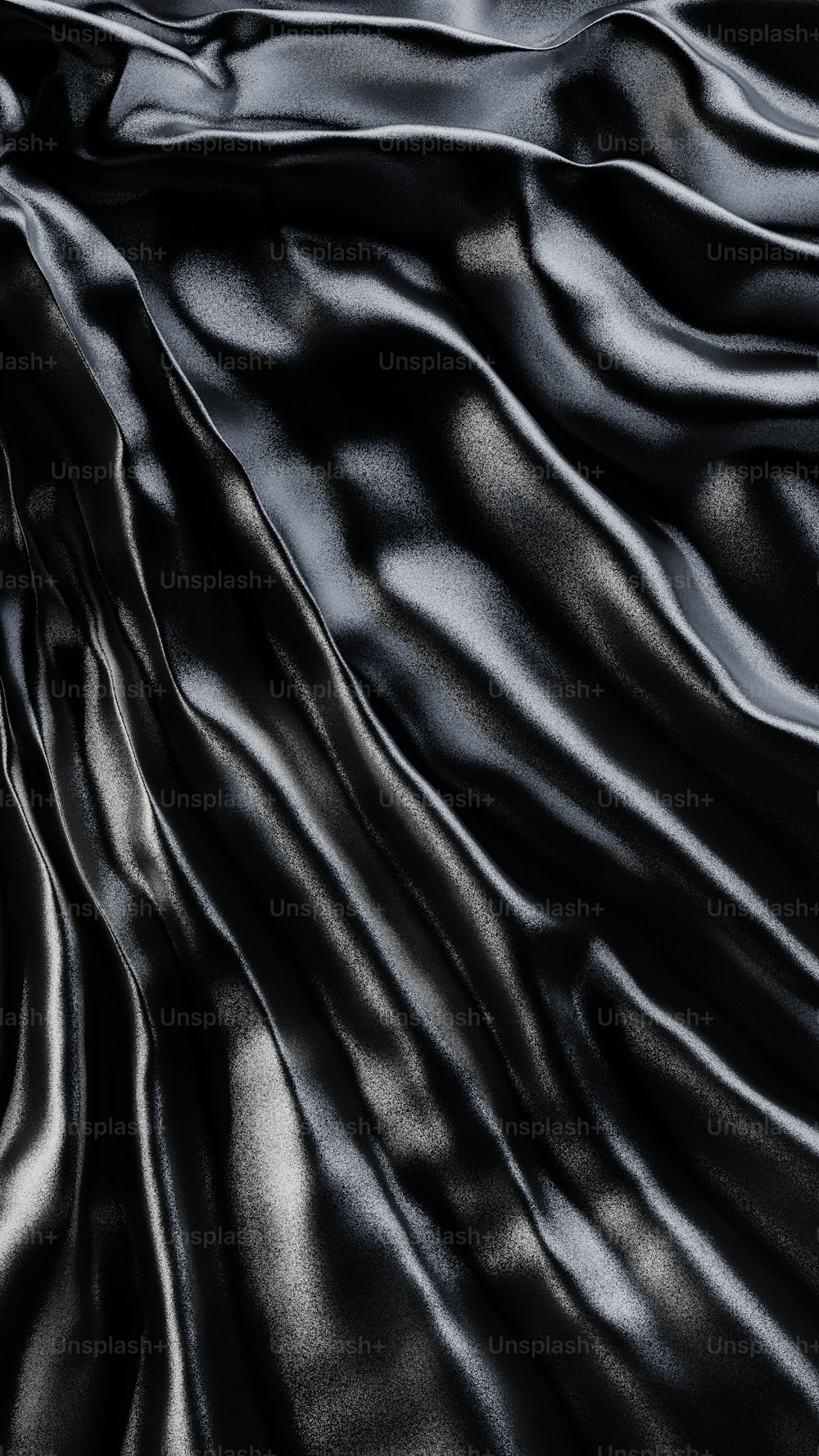 a black silk fabric with a very smooth finish
