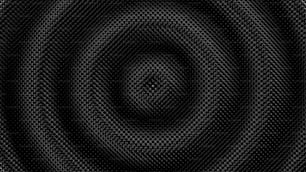 Un fondo negro con un diseño circular en el centro