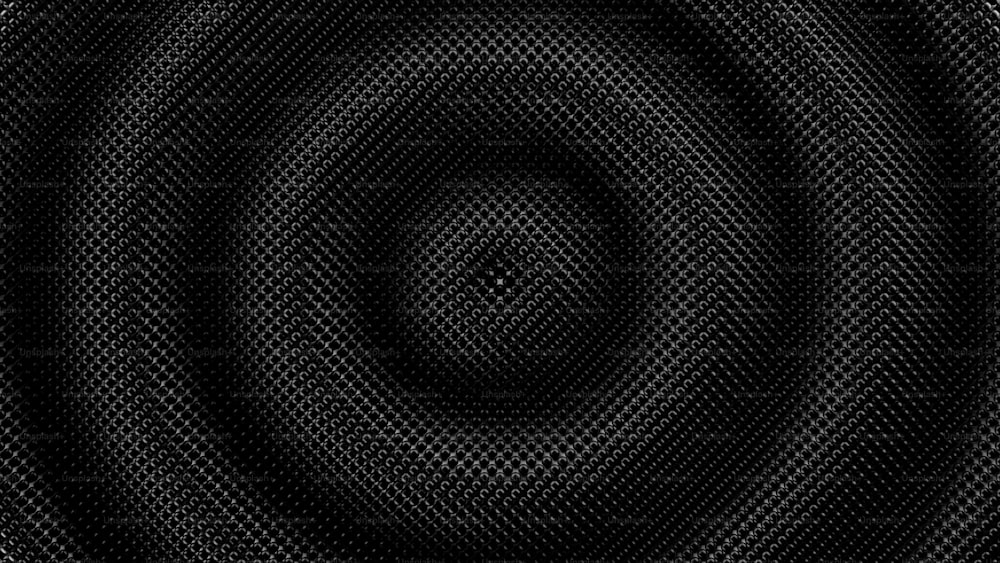 中央に円形のデザインの黒い背景