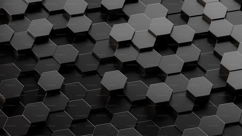 Une photo en noir et blanc d’un tas d’hexagones