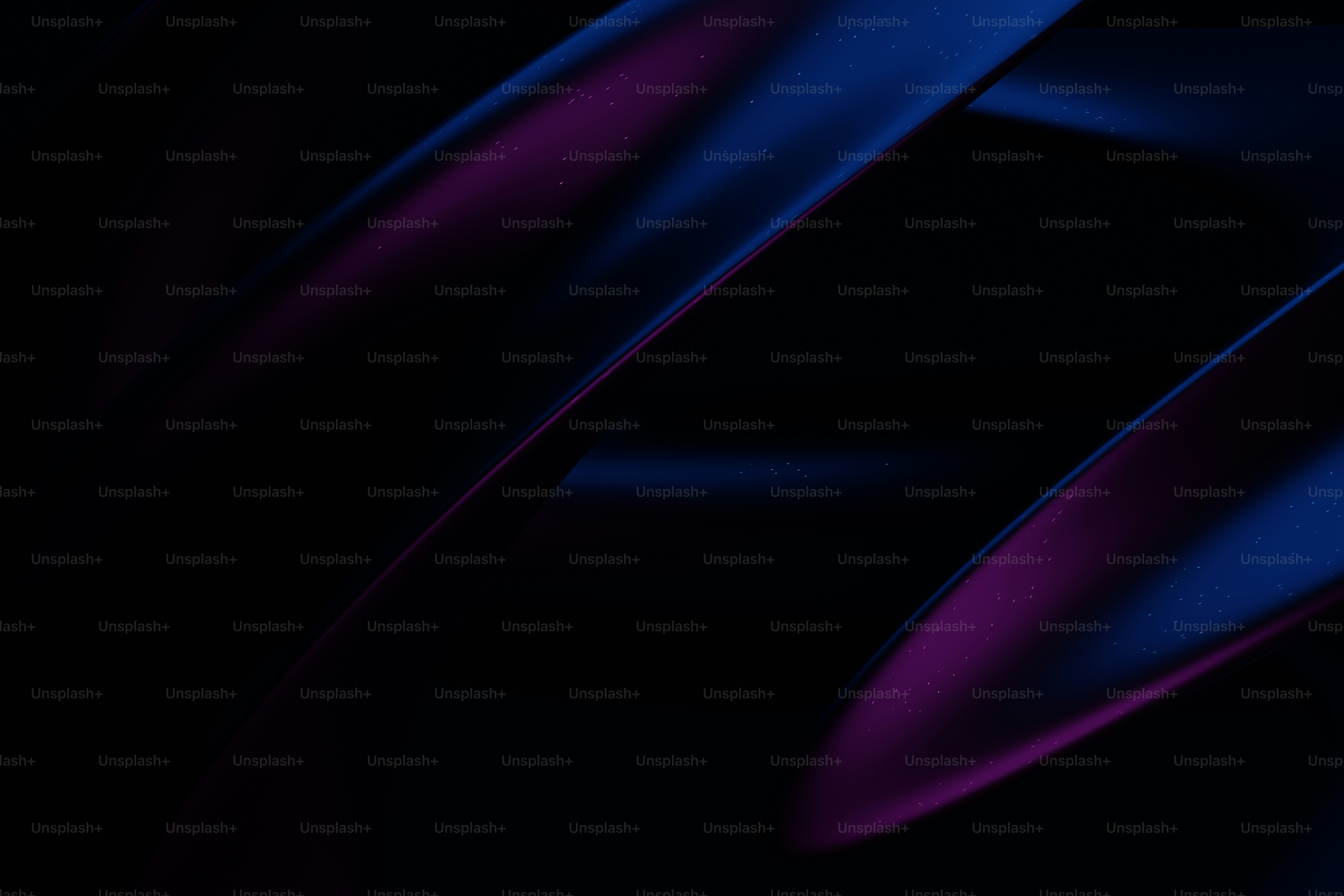 a blue and purple abstract background with wavy lines