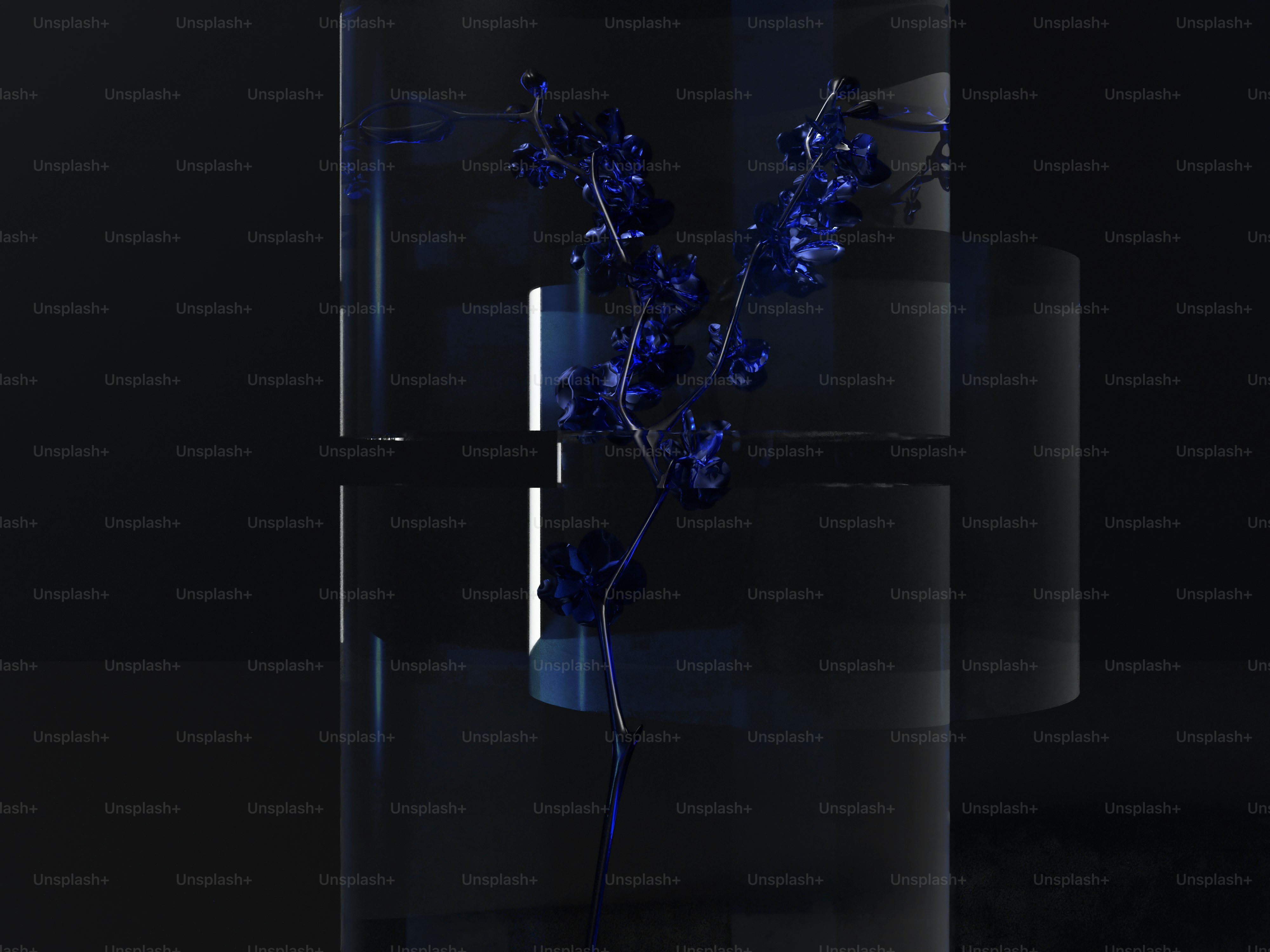 a glass vase with blue flowers in it