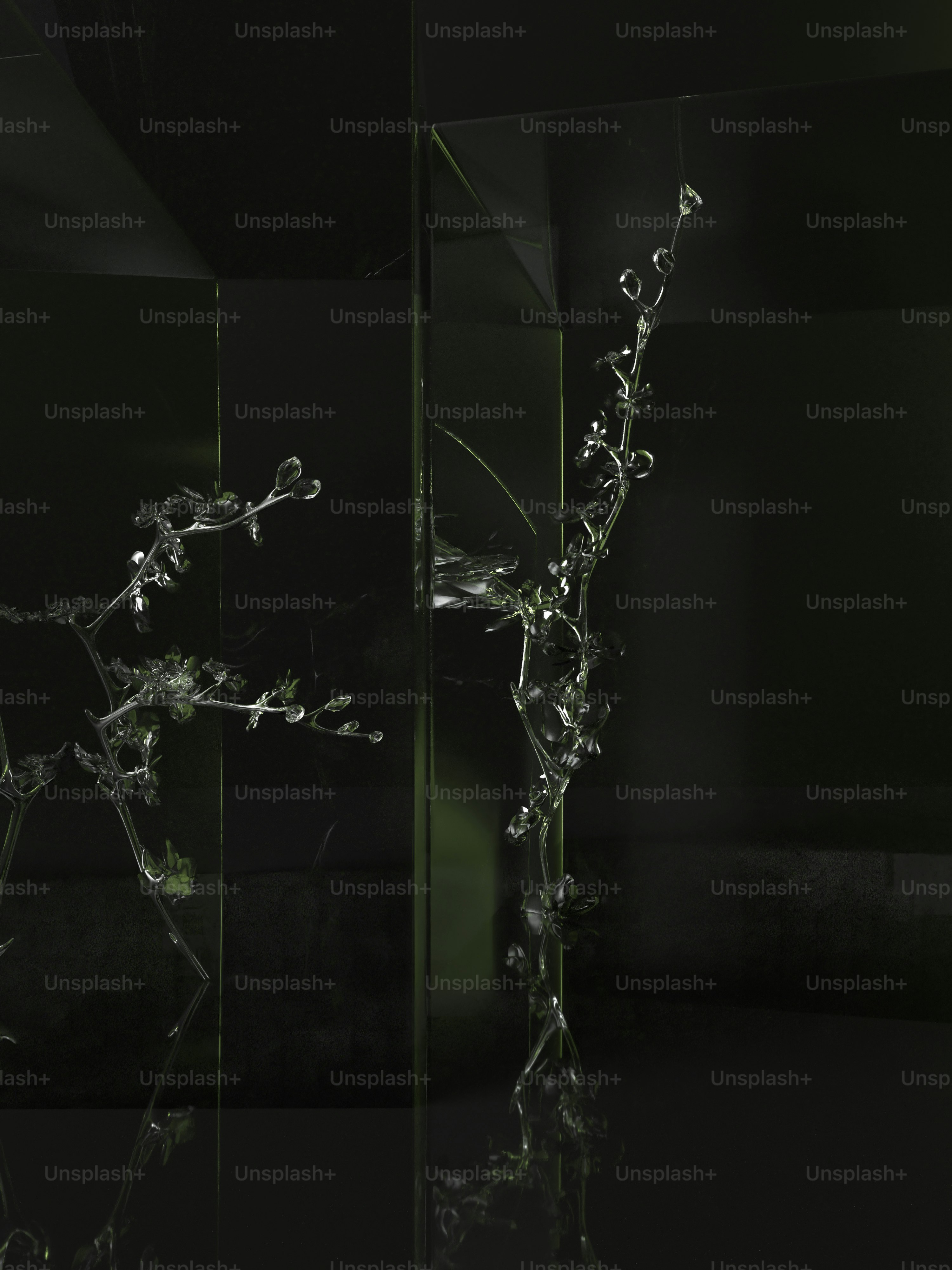 a black and white photo of a glass sculpture