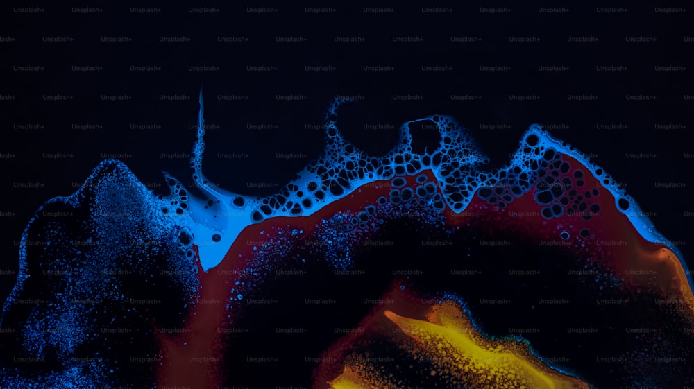 a black background with blue and red bubbles