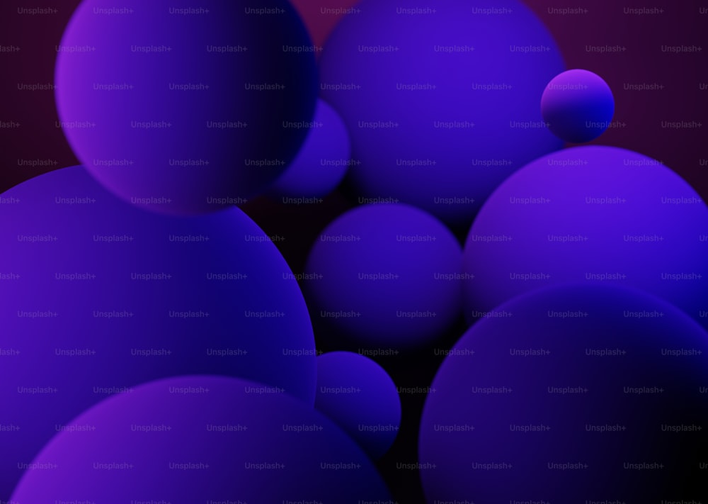 Un grupo de bolas púrpuras sentadas una al lado de la otra