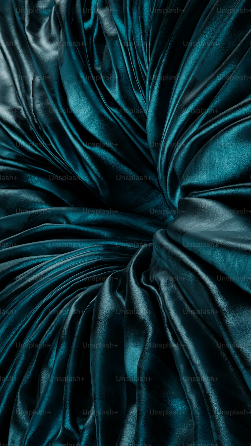 a close up view of a dark green fabric