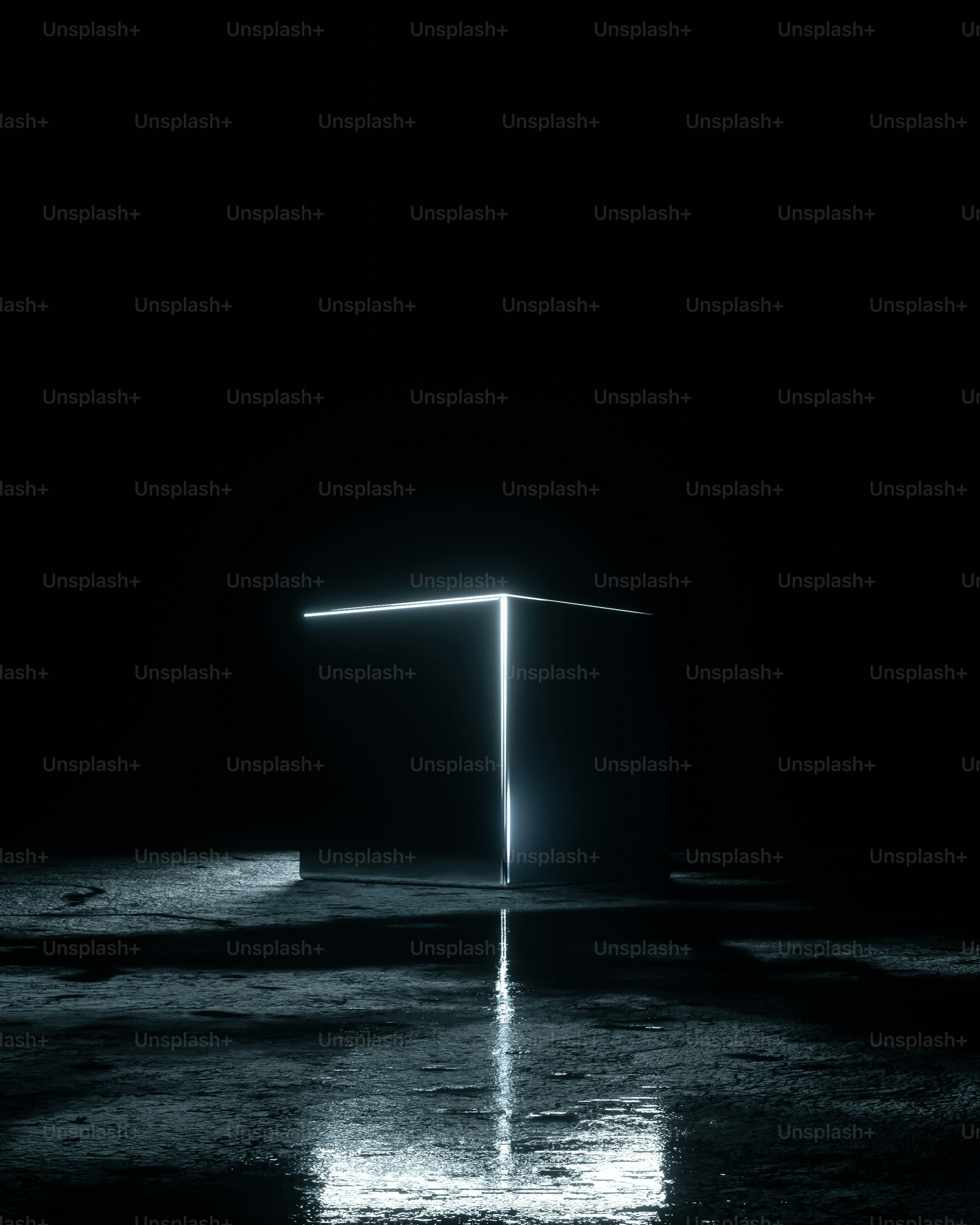 a black and white photo of a square object in the dark