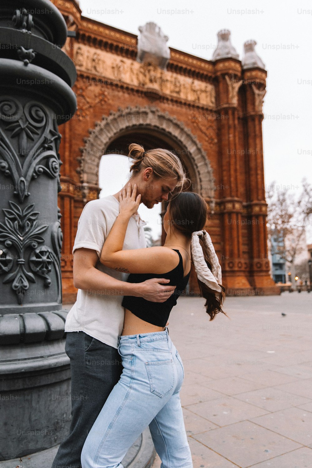 a man and a woman standing next to each other