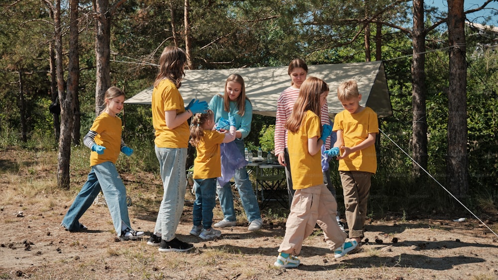 a group of young children standing next to each other