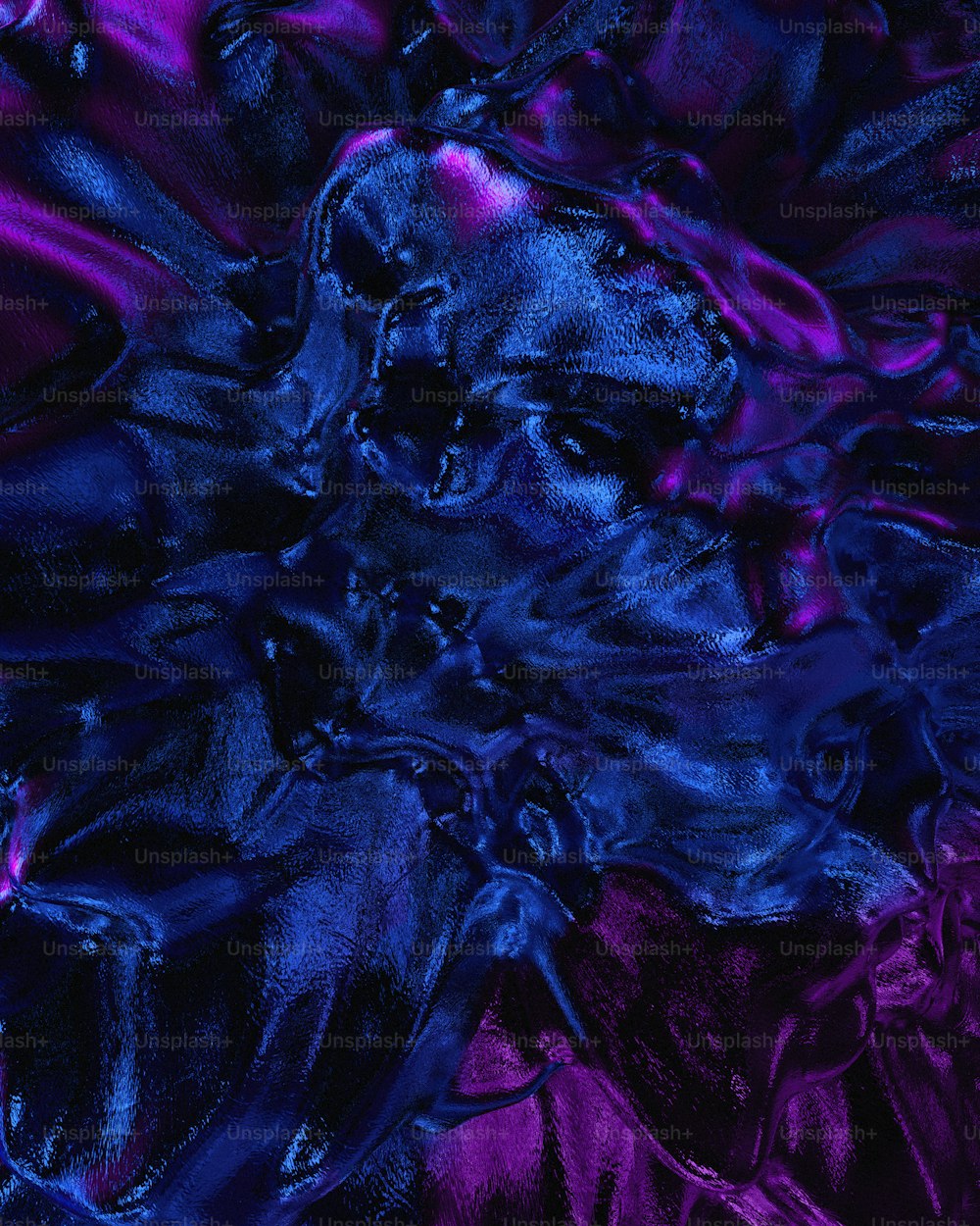 a close up of a purple and blue cloth
