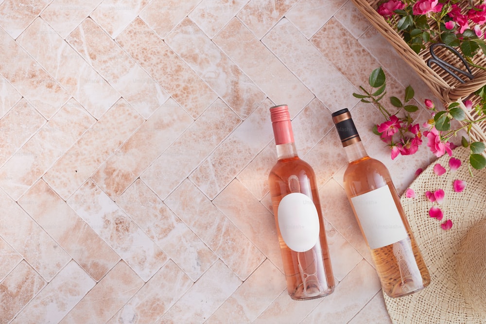 a couple of bottles of wine sitting on top of a table