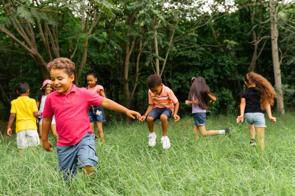 a group of children playing in a field