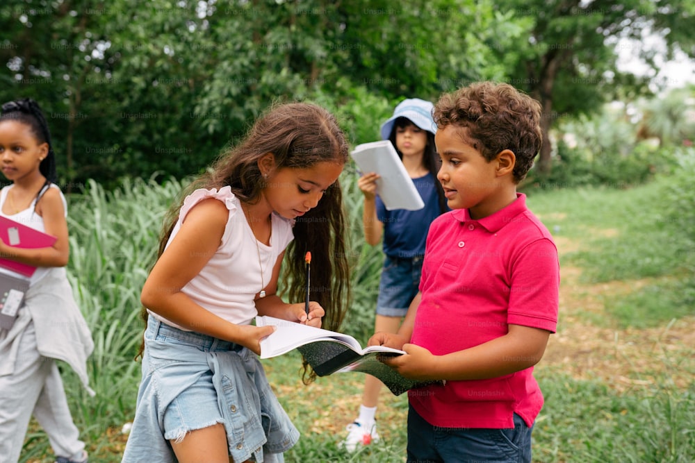 a group of young children standing next to each other