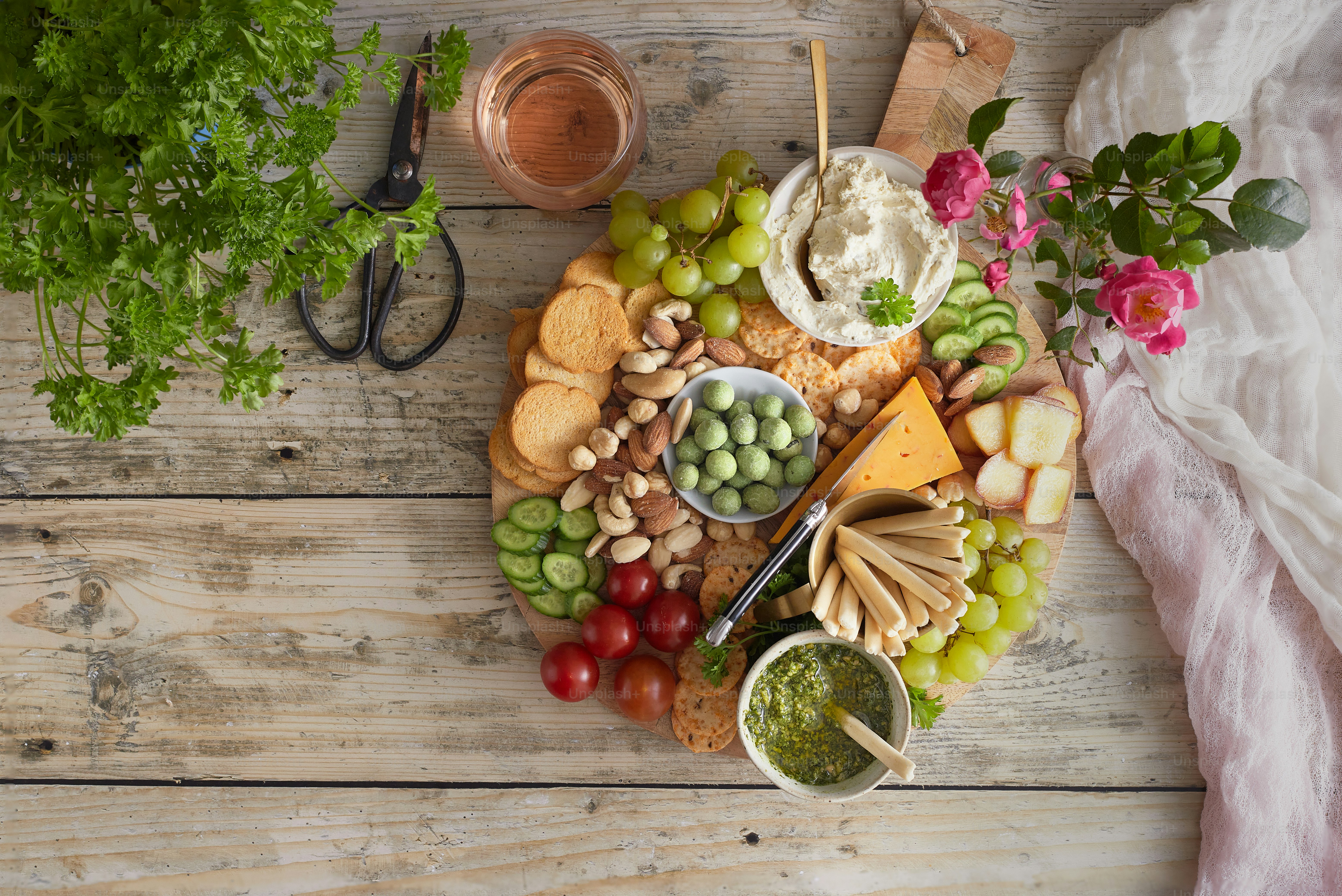 A platter of cheese, crackers, grapes and nuts photo Party food Image