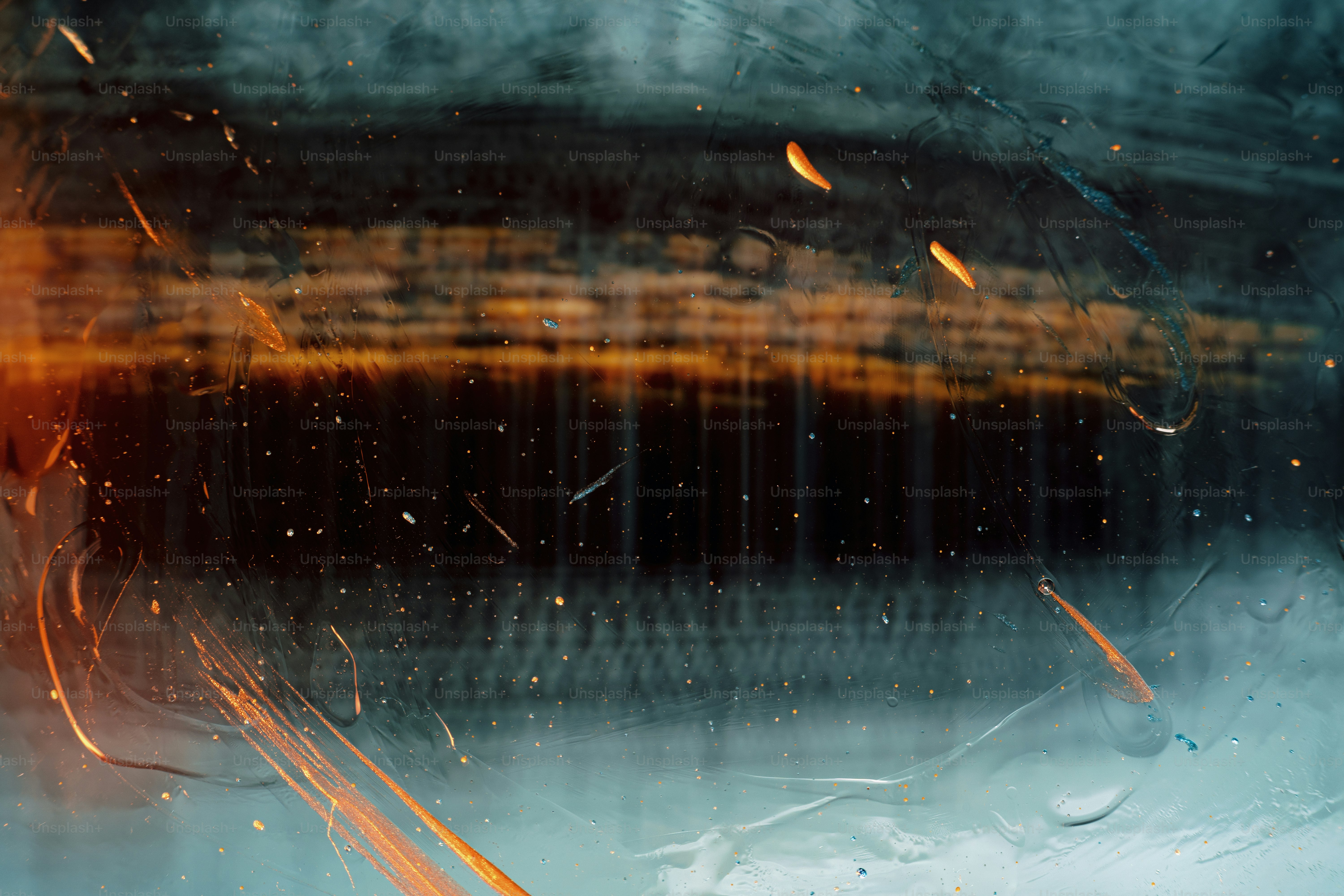 a close up of a window with rain drops