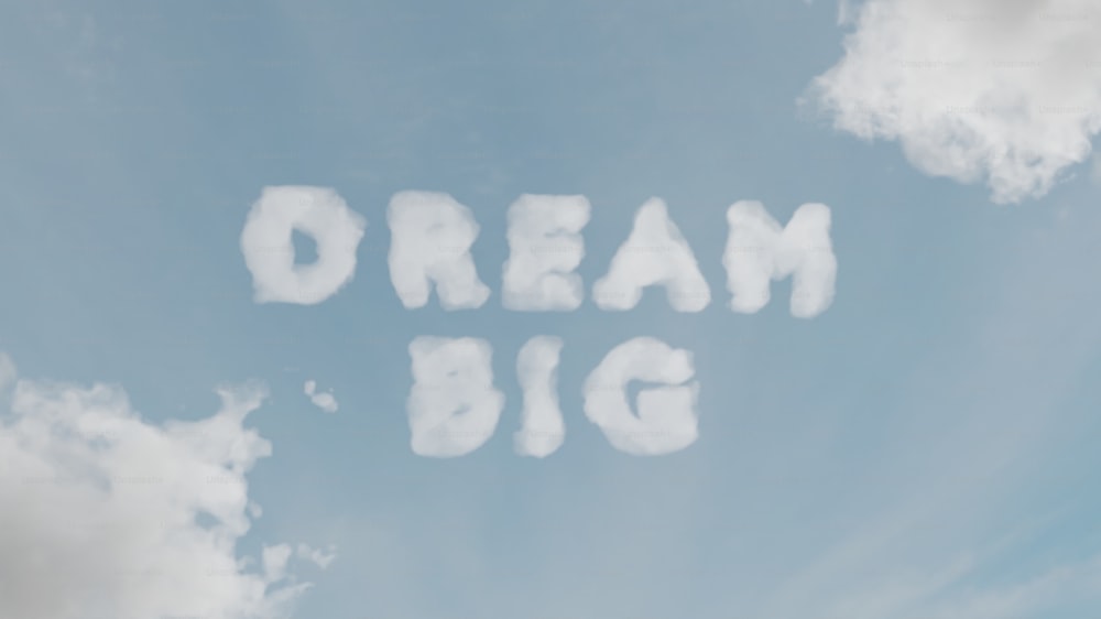 As palavras Dream Big escritas no céu