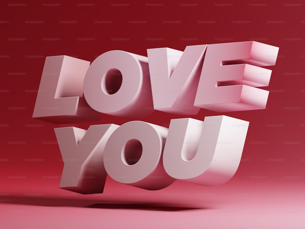La palabra Love You en letras 3D sobre fondo rojo