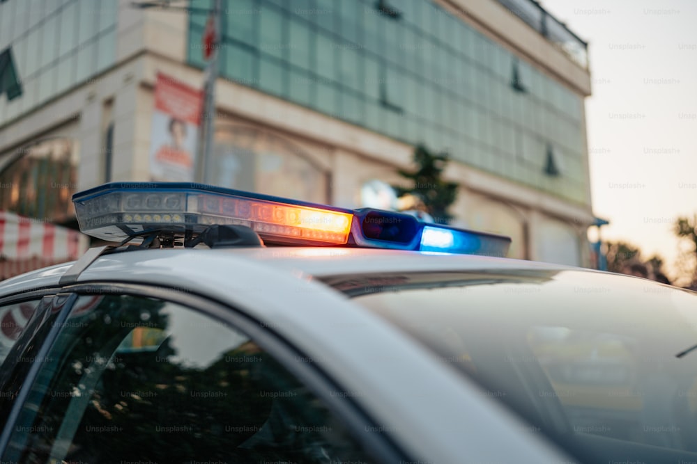 a close up of a police car with its lights on