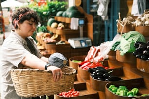 a woman holding a basket of vegetables in a market