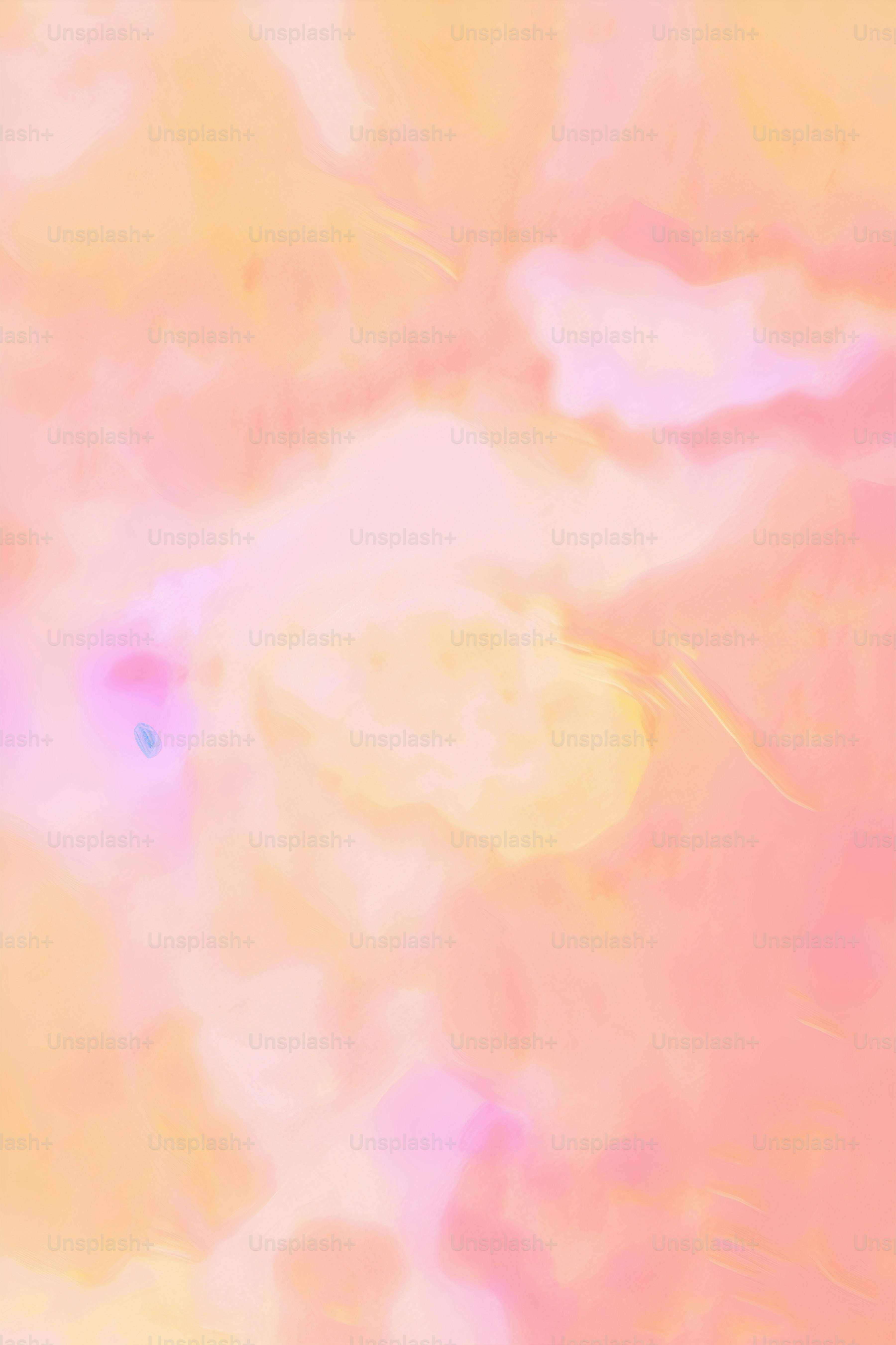 a blurry photo of a yellow and pink background