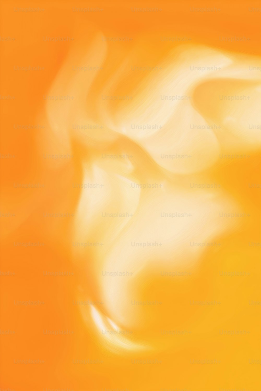 a blurry image of a yellow and white background