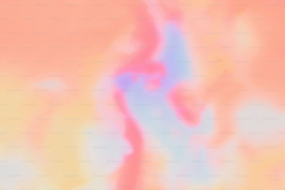 uma imagem borrada de uma substância rosa e azul