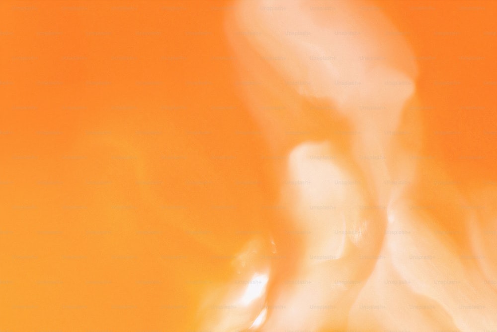 um close up de um fundo laranja e branco