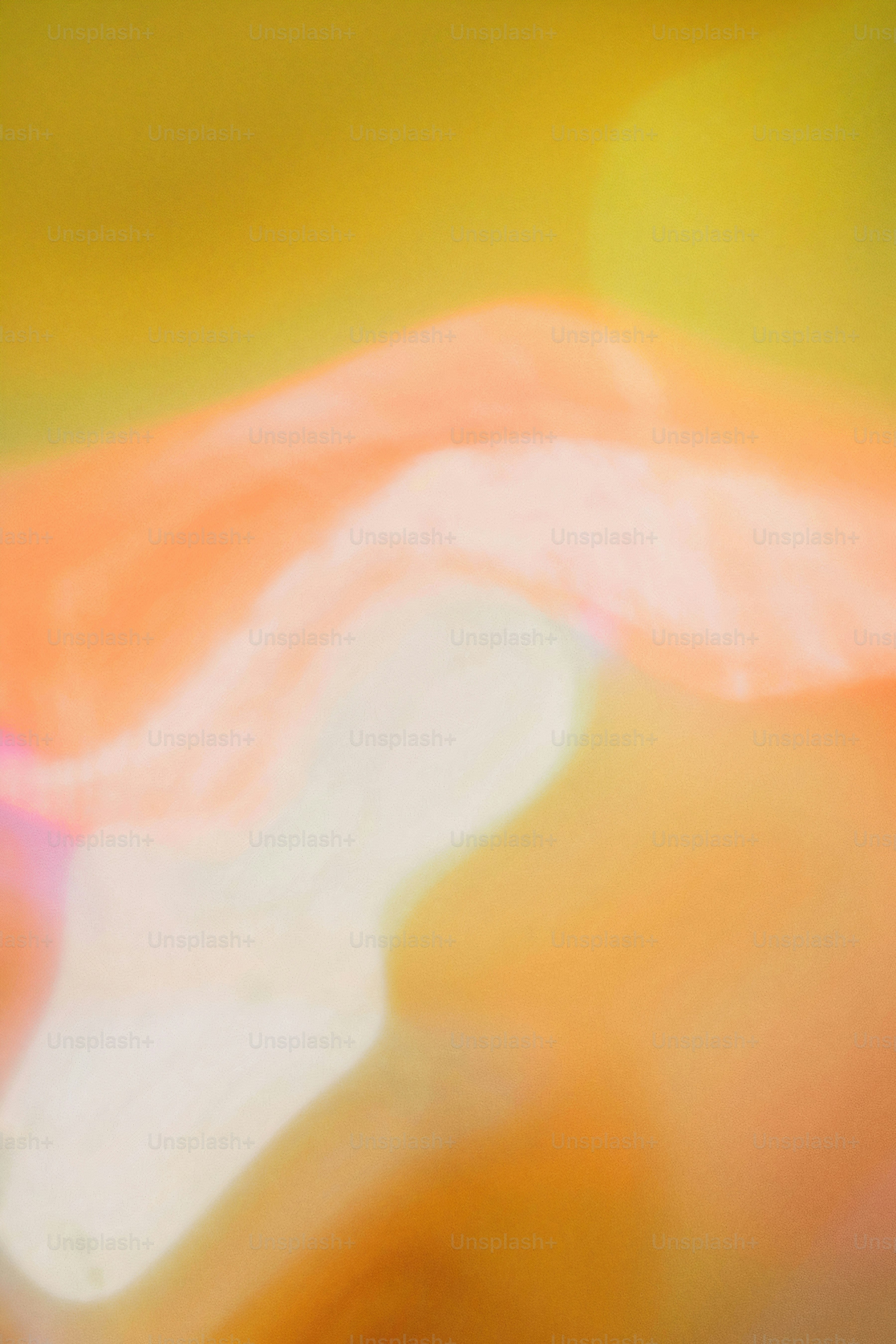 a blurry photo of a red and yellow object