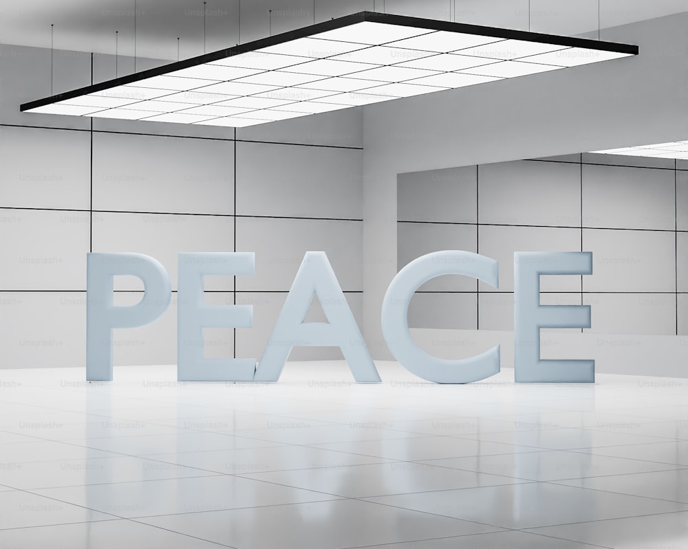 Una habitación blanca con un letrero que dice paz