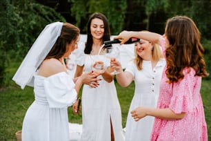 a group of women standing next to each other