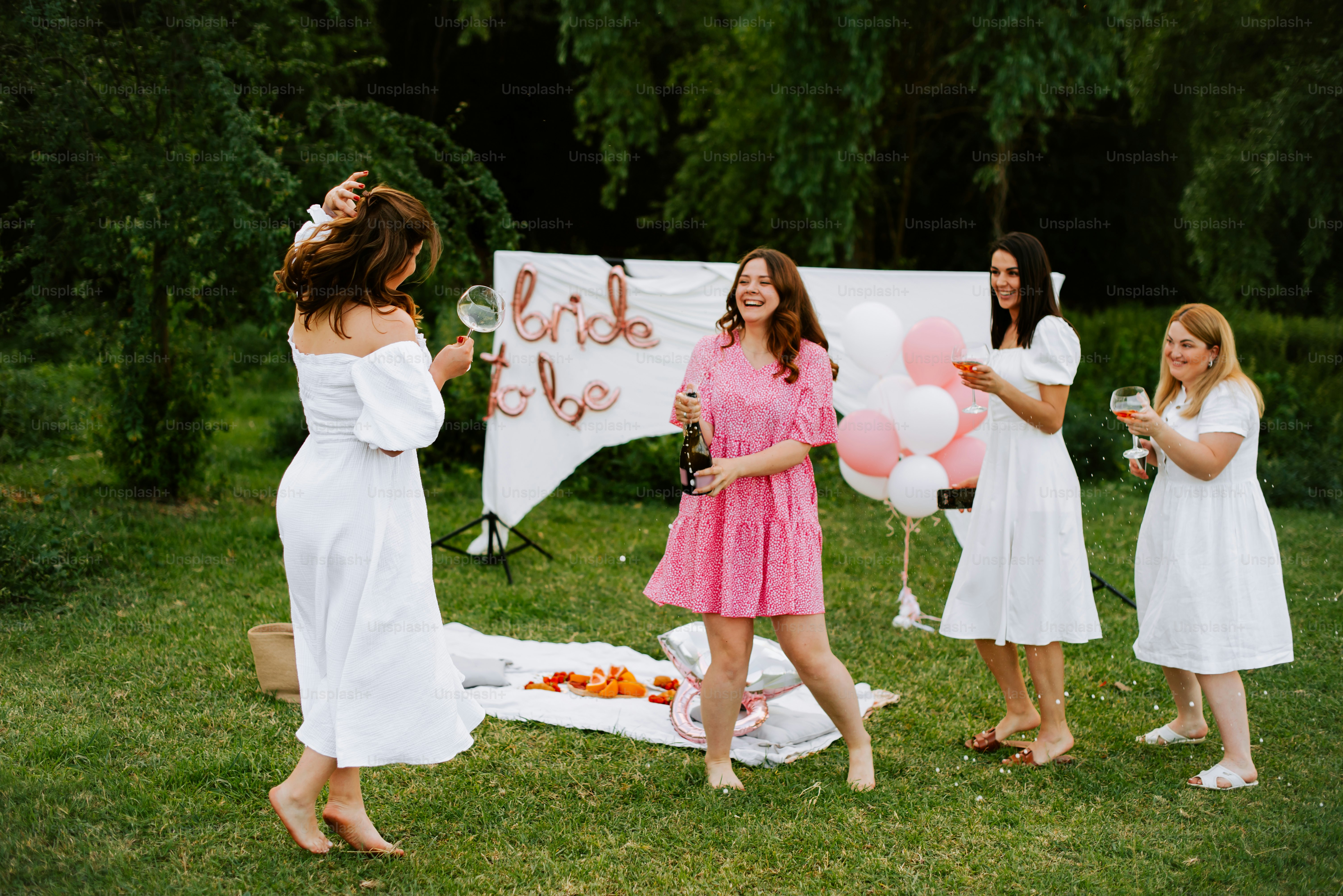 A group of women standing next to each other in a field photo – Outdoor ...