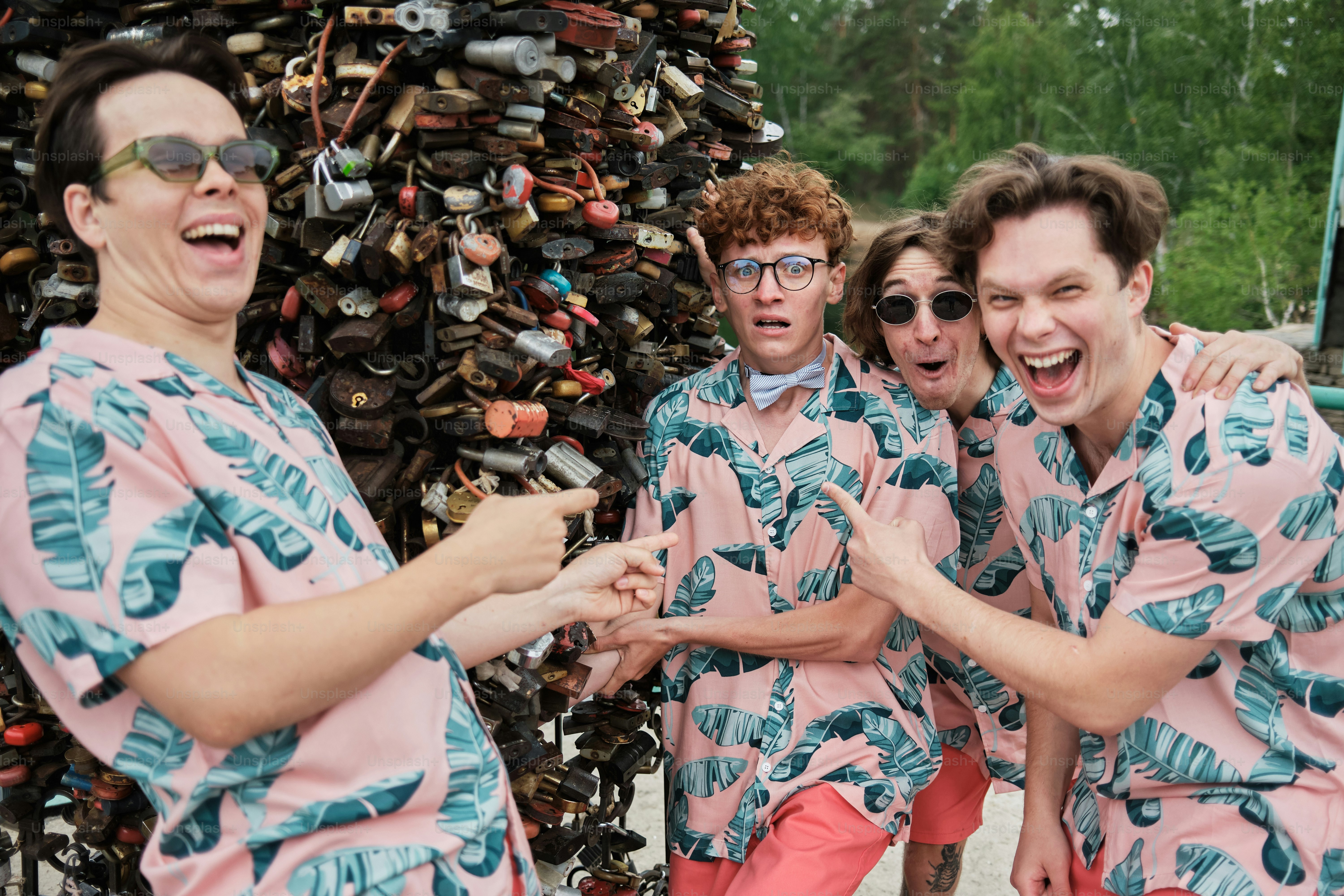 a group of young men standing next to each other