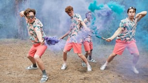 a group of young men playing a game of tug of war