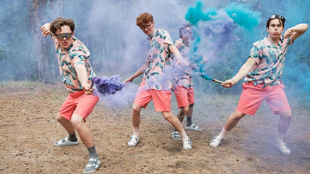 a group of young men playing a game of tug of war