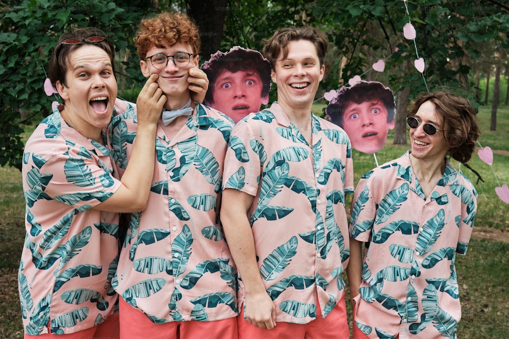 a group of people in matching shirts posing for a picture