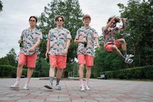 a group of young men standing next to each other