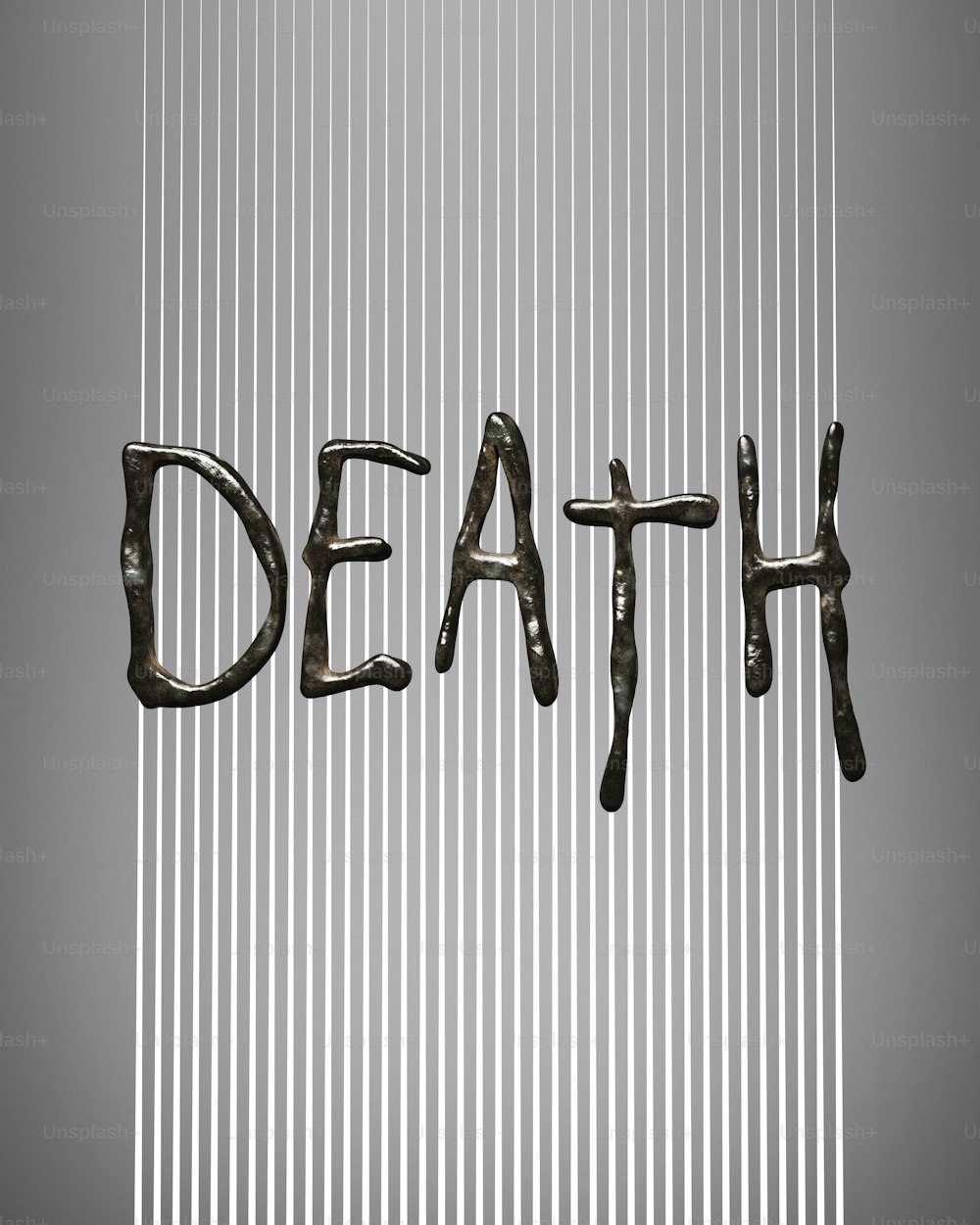 the word death is written in metal letters