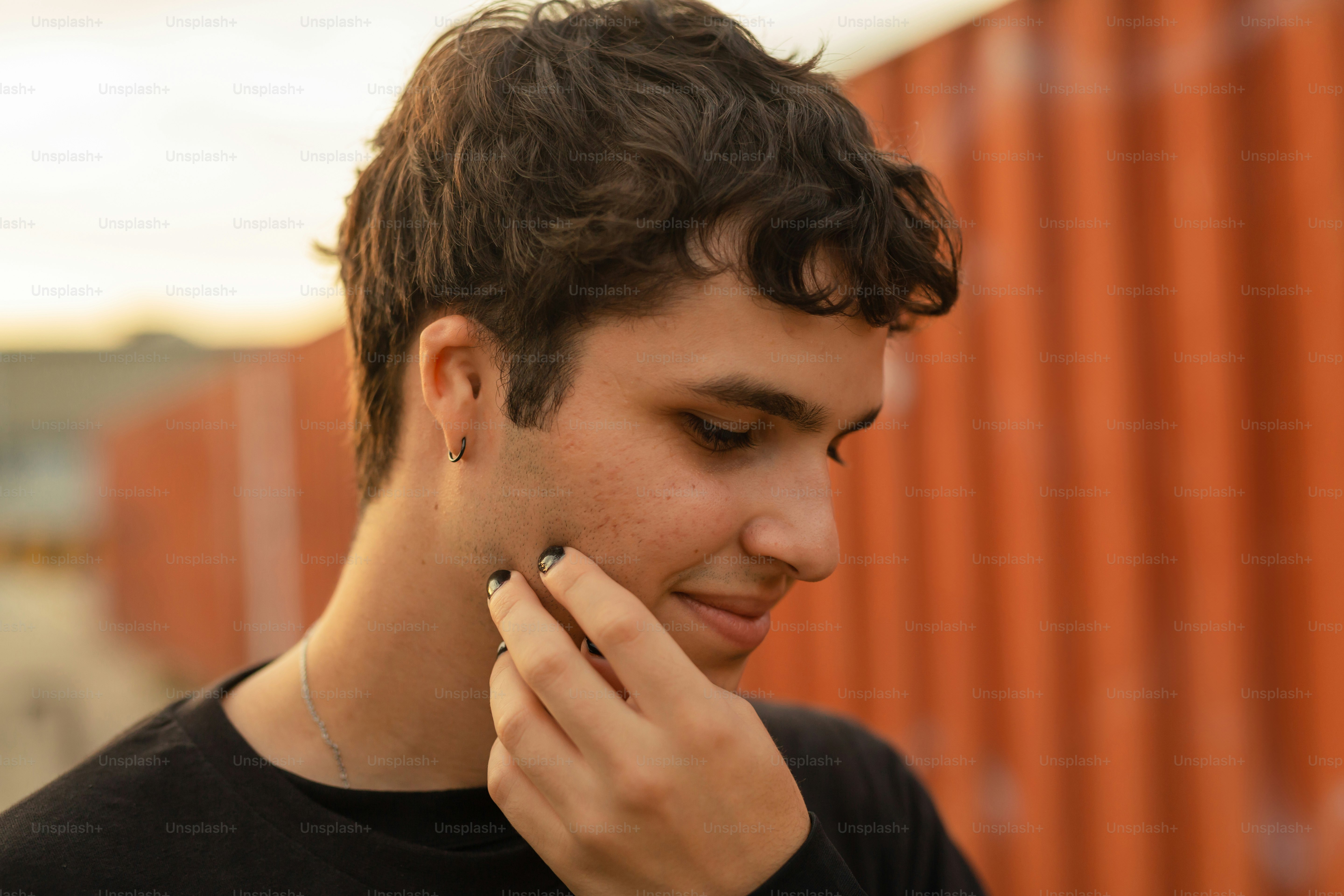 a man holding a cell phone to his ear
