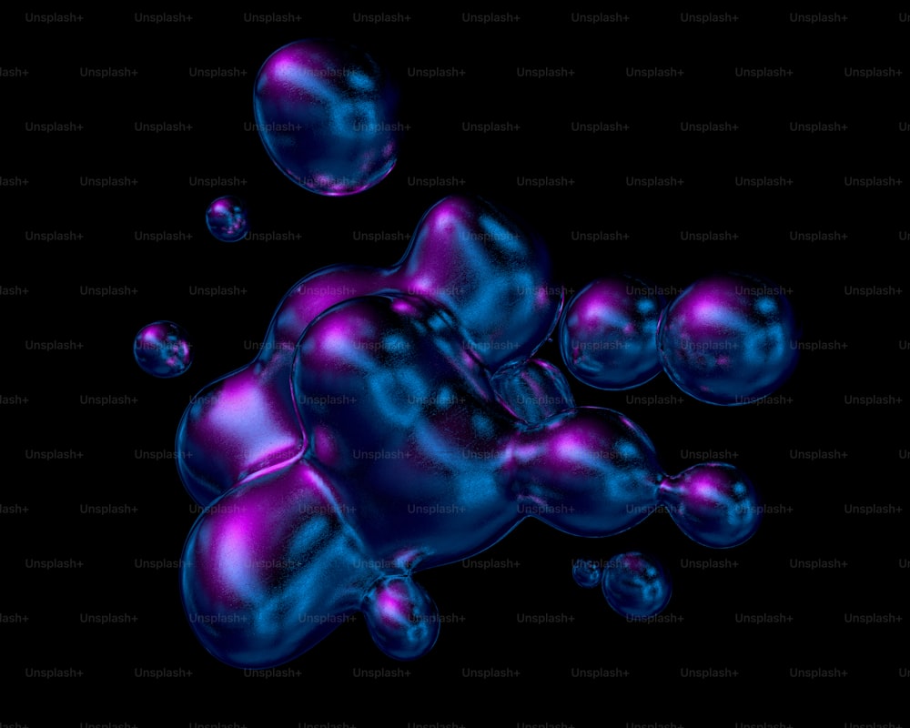 a group of blue and purple bubbles floating on top of each other