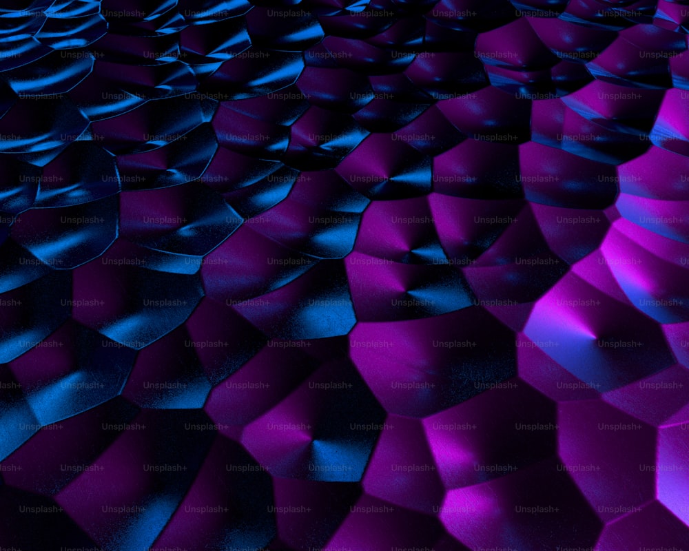 a purple and blue abstract background with wavy shapes