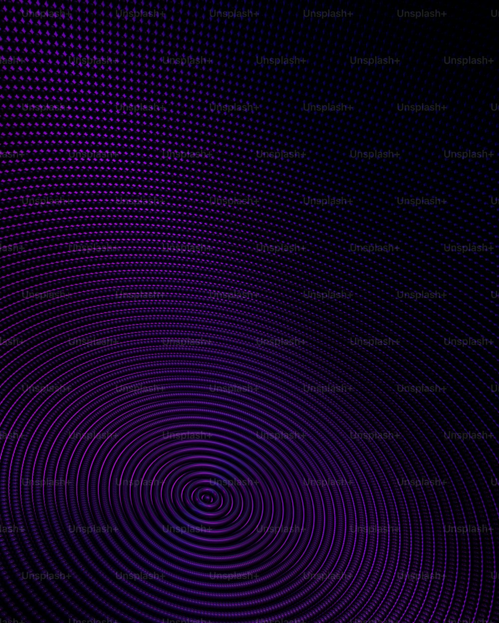 a purple background with a circular design in the center