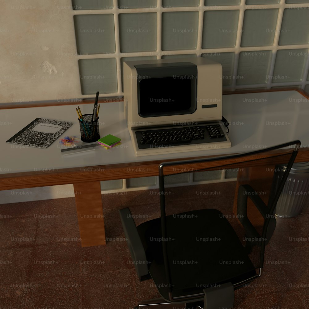 컴퓨터와 의자가 있는 책상
