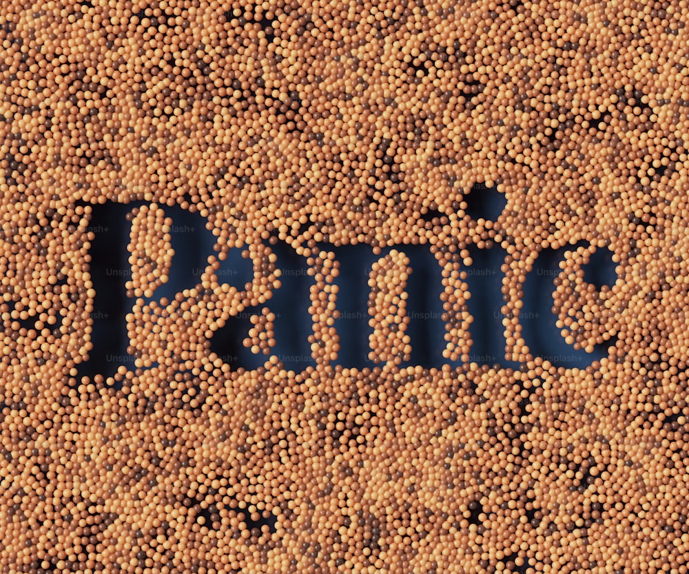 the word panic spelled out of small balls of mustard