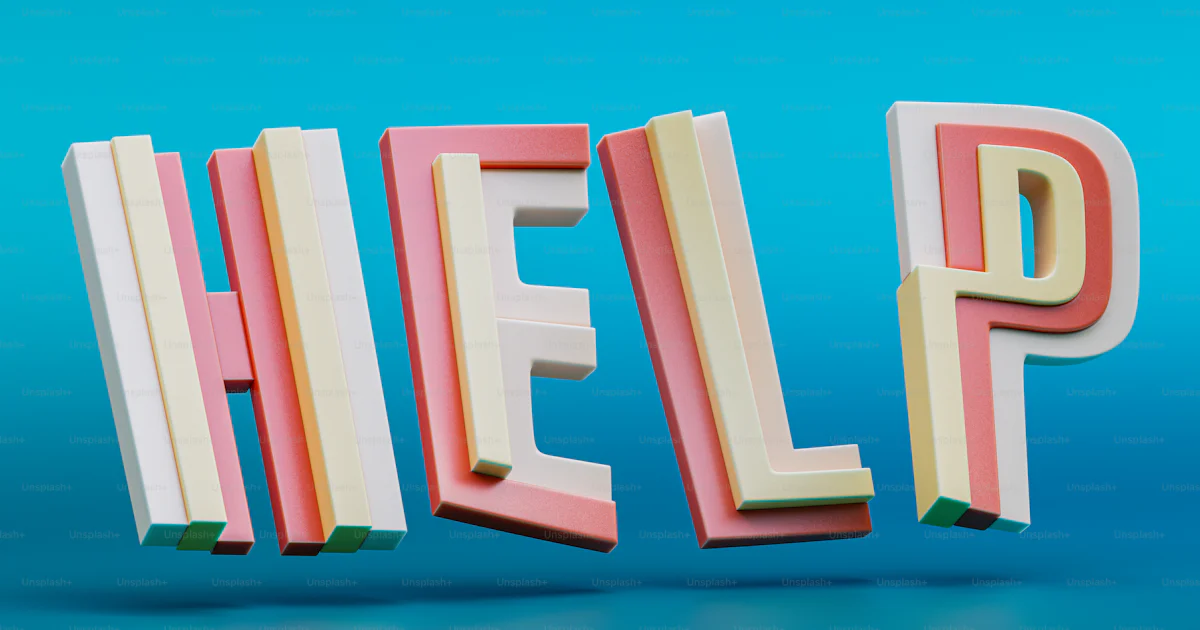 ヘルプという言葉は、色とりどりの文字で構成されていますの写真 – Unsplashのデジタル画像の画像