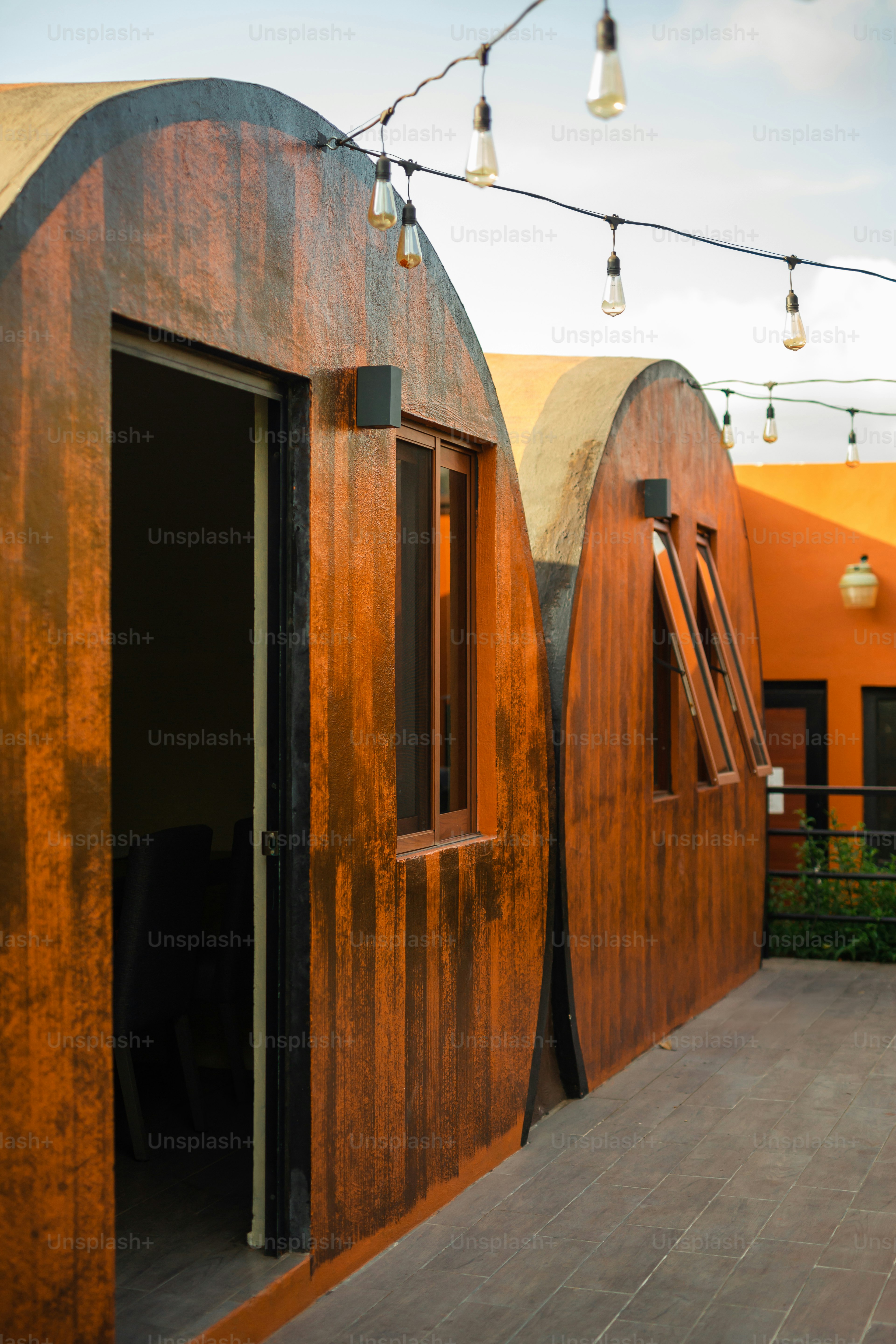 a couple of wooden buildings sitting next to each other